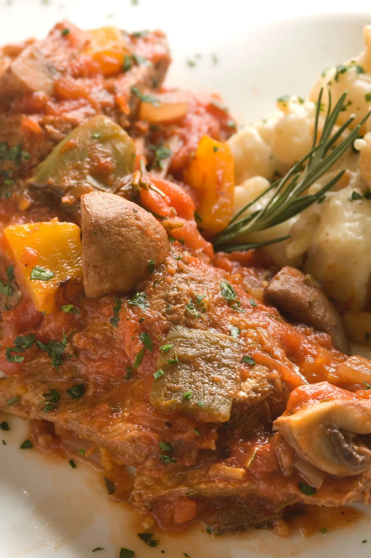 Braised Veal Cacciatore with Spicy Almond and Goat Cheese background image